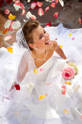 Woman Wearing Wedding Veil Laughing